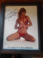 Front view of framed signed Marilyn Chambers photograph
