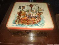 Top view showing medieval ship illustration and red border