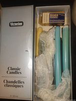 Open Victorian Classic Candles box showing assorted taper candles and small Silver accessory box