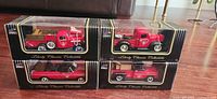 Four boxed Liberty Classics Canadian Tire trucks, front view