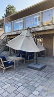 Full view of cantilever umbrella opened on patio