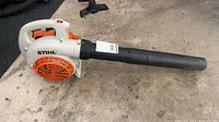Left side view of Stihl BG 56 C leaf blower showing brand label, engine housing, nozzle