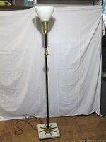 Full view of lamp showing shade, stem, and base