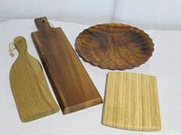 All four wooden serving pieces laid out