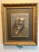 Full view of framed print showing entire frame and mat