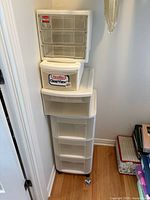 All three storage units stacked: rolling cart, single deep drawer, small 3-drawer unit