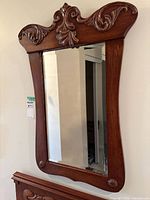 Front view of mirror showing entire frame and glass