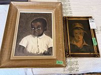 Both framed portraits side by side