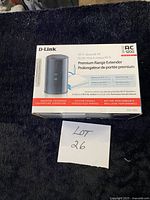 Front of boxed D-Link DAP-1650 range extender showing model and AC1200 rating