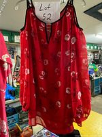 Front view red cold-shoulder floral blouse