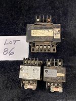 Lot overview showing three transformers