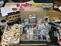 Wide view of assorted craft items on tabletop