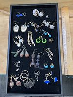 Full tray view showing all earring pairs