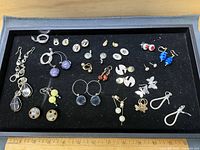 Tray showing full assortment of earrings