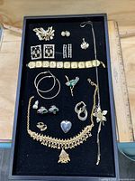 Full tray view showing all costume jewellery pieces