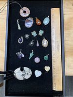 Full tray with ruler showing all pendants