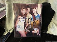 Front view of signed photo showing signatures