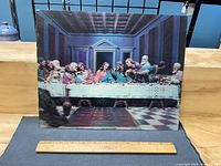Front view of entire Last Supper picture with ruler for scale
