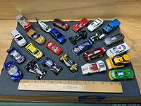 All 22 cars laid out with ruler