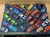 Overview of the 31 vehicles laid out beside ruler