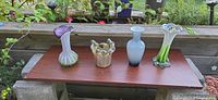 All four art glass pieces on board outdoors
