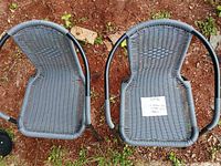 Top view of both grey wicker patio chairs showing overall condition