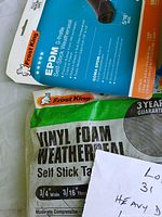 Frost King EPDM and vinyl foam weatherseal packages visible