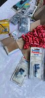 overview of red wire connectors, Purolator valves, misc packaged parts