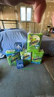 Group shot showing all Bounty paper towel packs and Lysol cleaner boxes