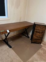 Desk and storage stand side by side