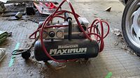 Overall view of Mastercraft Maximum compressor with hose attached