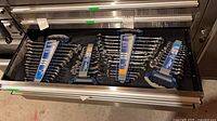 Drawer holding four Mastercraft Maximum combination wrench sets