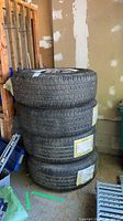 Stack of four Goodyear tires