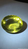 Front view of oval lemon citrine showing color and faceting