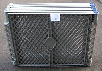 Stack of eight lattice safety gates front view