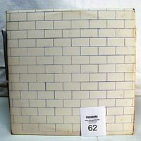 Front cover with white brick design