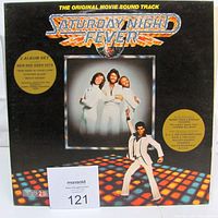 Front cover of gatefold jacket with title and hype stickers