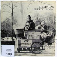 Front cover of Steely Dan Pretzel Logic LP with lot card visible