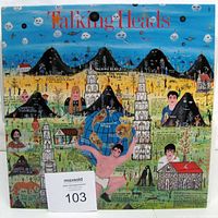 Front jacket artwork with Maxsold lot tag visible