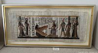Front view of framed papyrus artwork showing entire piece and frame