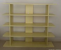 Front view showing five shelves and central support