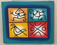 Full view of painted textile showing four quadrants and teal border