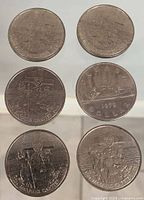 Six Canadian dollar coins front side