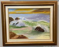 Overall view of framed seascape painting