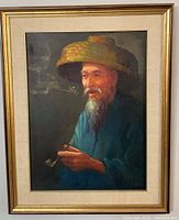 Full view of framed portrait showing subject and frame