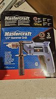 Boxed Mastercraft hammer drill front view