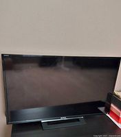 Front view of Sony 32-inch TV on stand