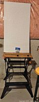 Workbench with pegboard and hooks