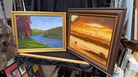 Both framed paintings side by side showing size and frames