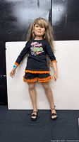 Full view of 3-foot Susan Lippl doll in Halloween outfit